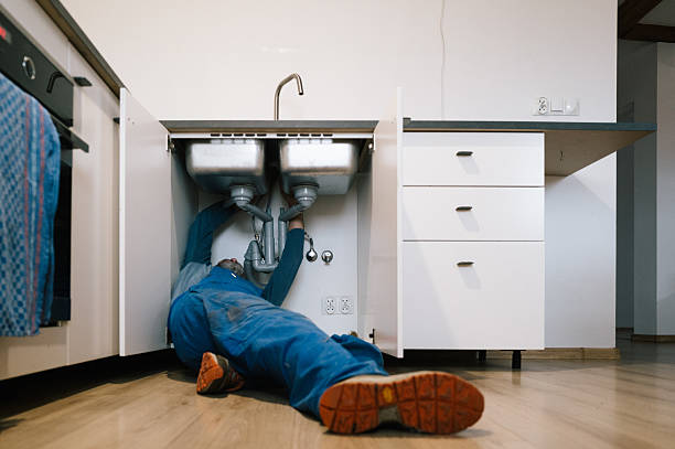 Professional Plumbing technician working in Donald, OR
